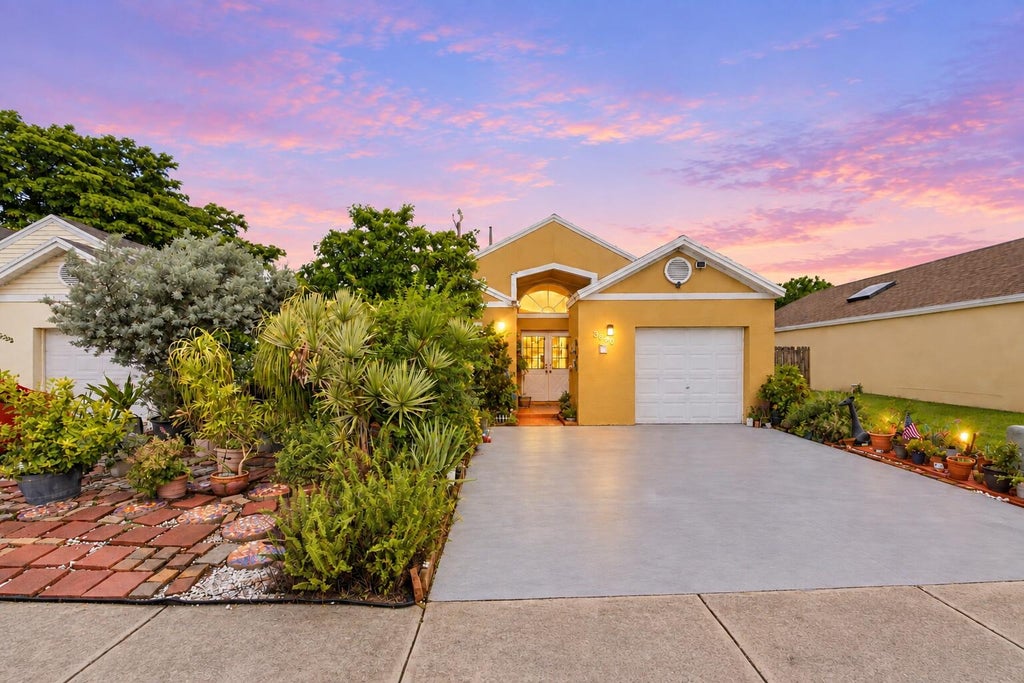 Photo of 3680 Marlberry Lane, Miramar, FL 33025 (MLS # B26074862)