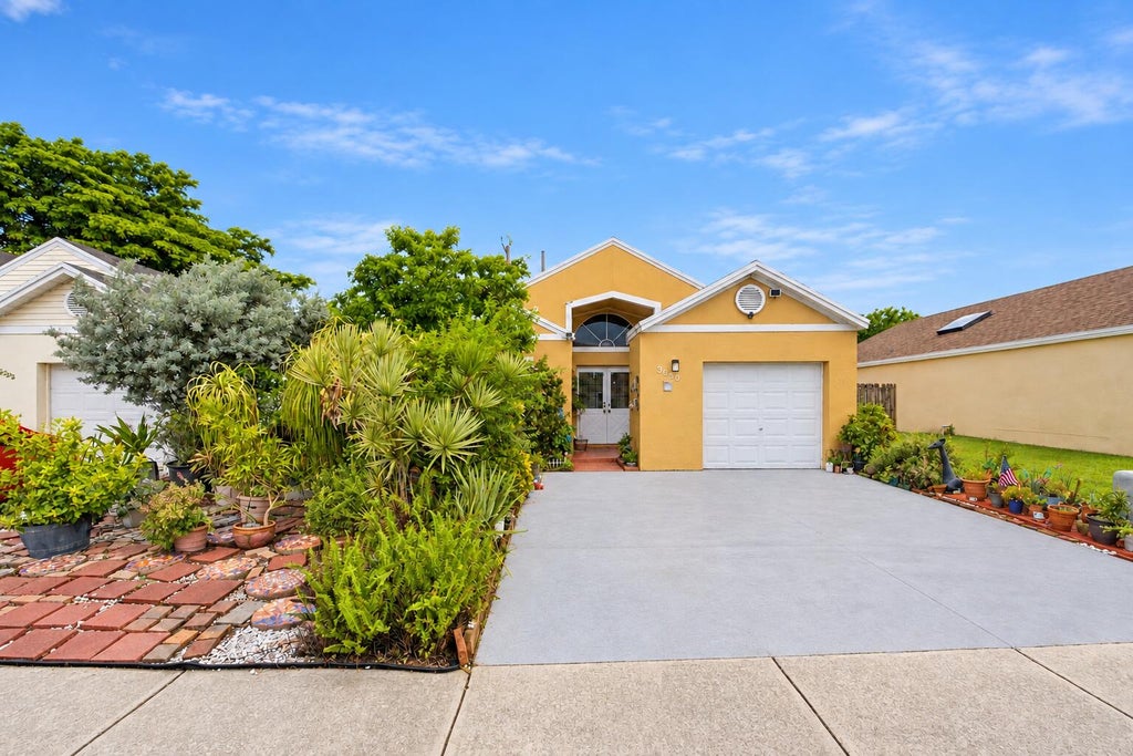 Photo of 3680 Marlberry Lane, Miramar, FL 33025 (MLS # B26074862)