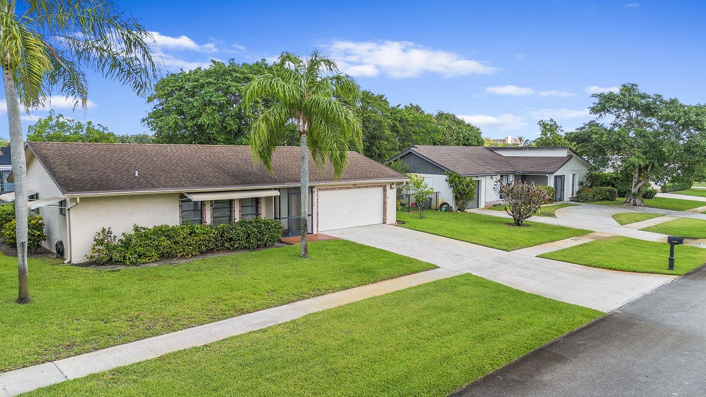 Photo of 14765 Woodlodge Lane, Delray Beach, FL 33484 (MLS # R11088375)