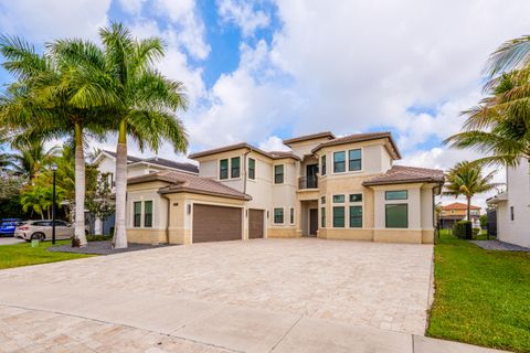 Photo of 9801 Rennes Lane, Delray Beach, FL 33446 (MLS # B26010948)