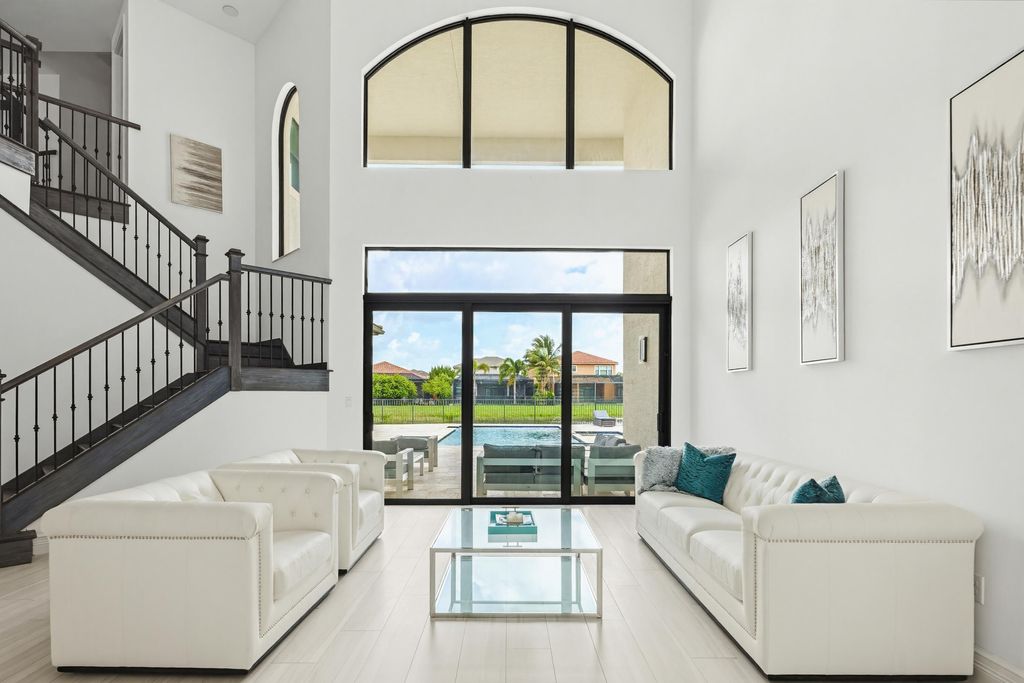 Photo of 9801 Rennes Lane, Delray Beach, FL 33446 (MLS # B26010948)