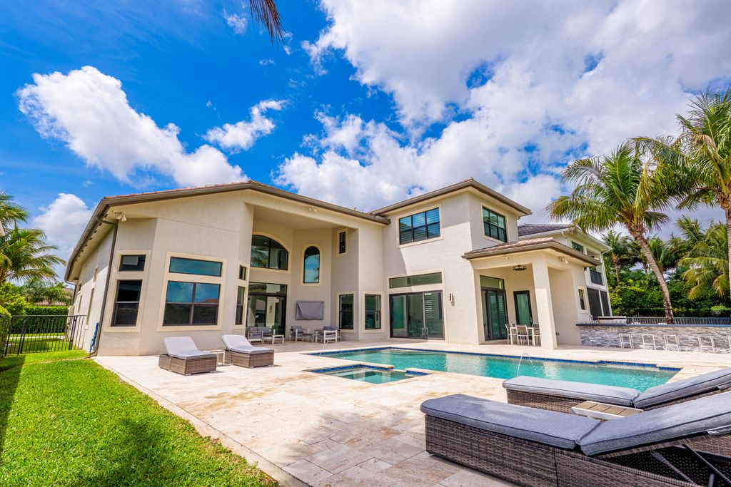 Photo of 9801 Rennes Lane, Delray Beach, FL 33446 (MLS # B26010948)