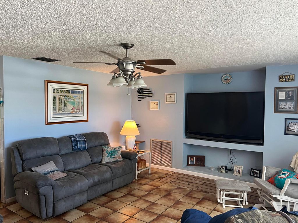 Photo of 5909 Myrtle Drive, Fort Pierce, FL 34982 (MLS # R10976300)