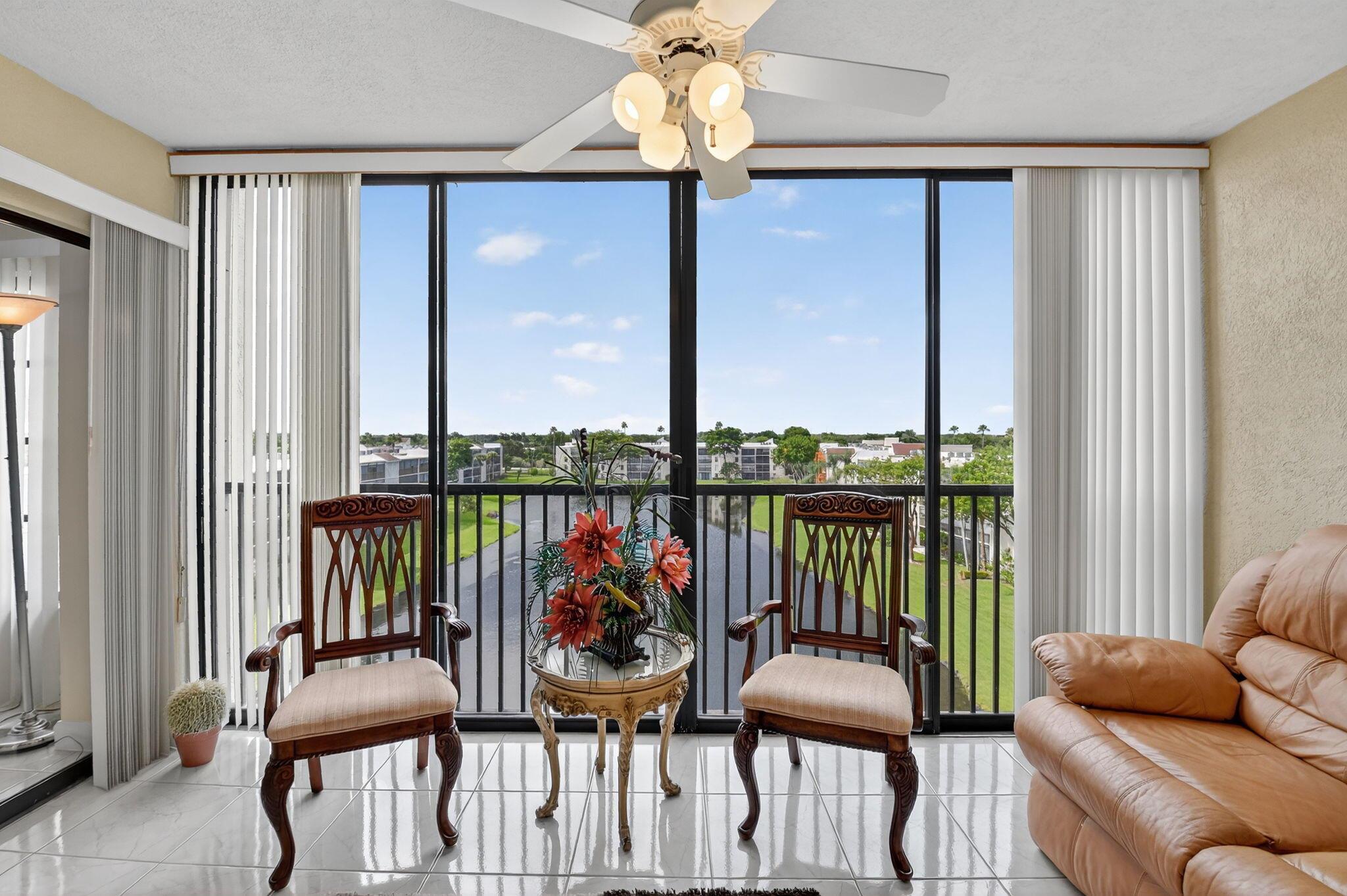 Exceptional Buckingham model 2 bedroom & 2 baths with Florida room / den, overlooking a stunning long lake view The 6th floor offers a magnificently bright exposure throughout the apartment. Upgraded italian porcelain tiles throughout the main living area offer an elegant foundation for this special home.the spaciaous primary bedroom offer 2 walk in closets & elegant owner bath with roman tub, and granite counters for the vanity. The guest bedroom and full bath with shower a comfortable place for guests or an office environment. The kitchen is upgraded with stainless steel appliances and upgraded cabinets with granite counters. The building is well located a short distance from a satellite clubhouse and pool. The main clubhouse offers an environment for entertainment. See it now!