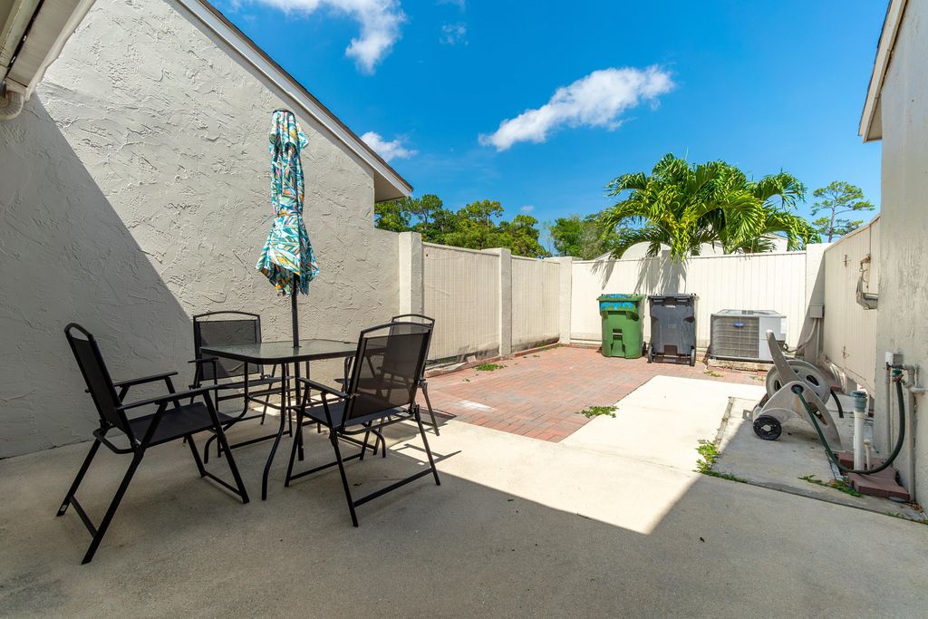 Photo of 12858 Spinnaker Lane, Wellington, FL 33414 (MLS # B26030809)