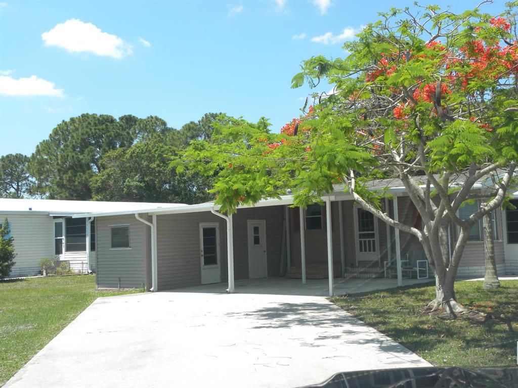 Photo of 207 Mangrove Bay Place #11, Fort Pierce, FL 34982 (MLS # R10797490)