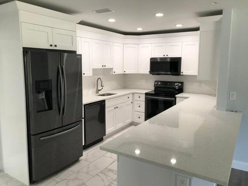 Photo of 12944 SE Papaya Street, Hobe Sound, FL 33455 (MLS # R10976878)