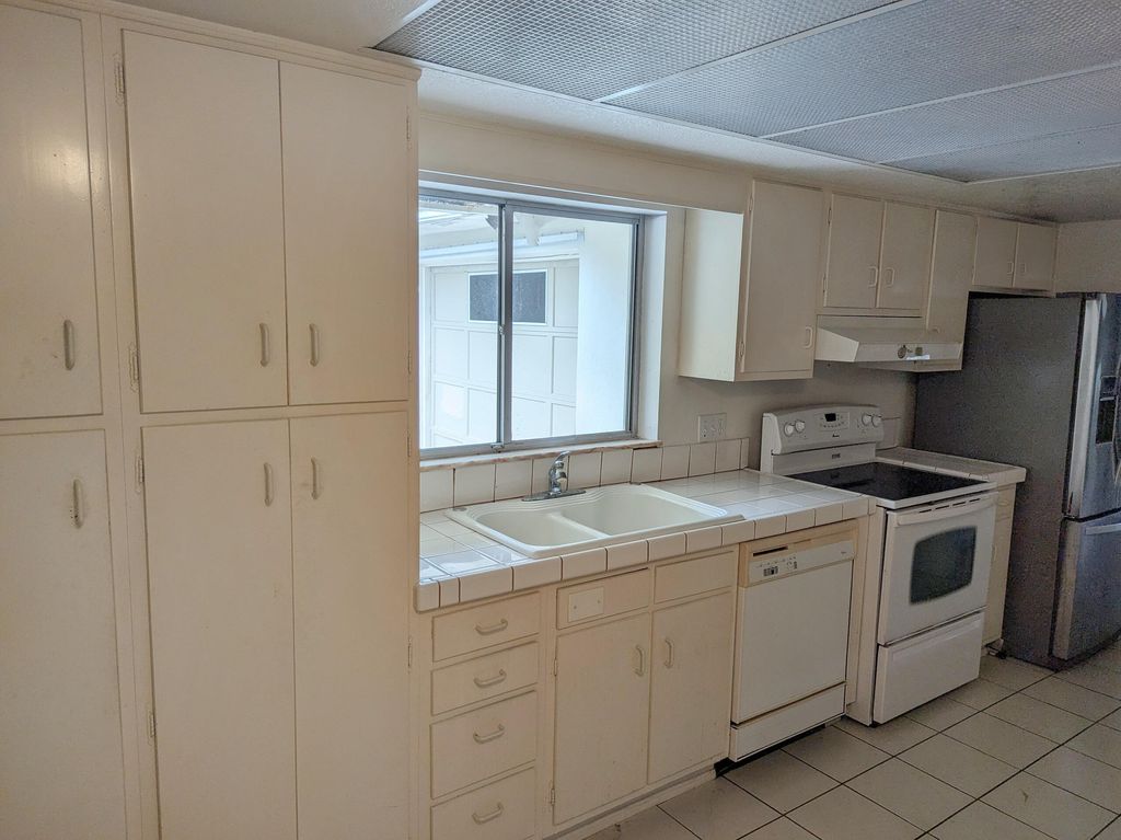 Photo of 142 N Naranja Avenue, Port Saint Lucie, FL 34983 (MLS # R11163654)