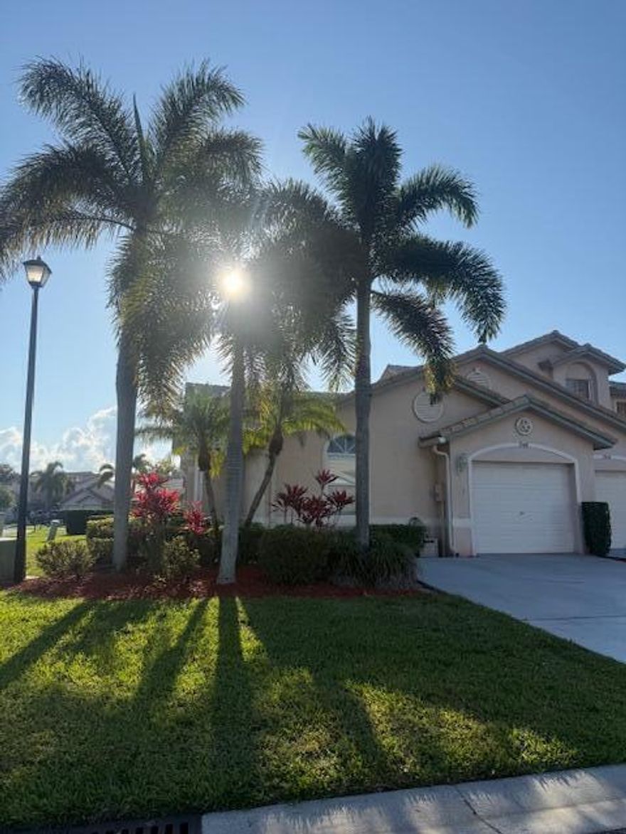 Beautifully updated and spacious villa with an open-concept layout, abundant natural light, and soaring vaulted ceilings. Features a modern kitchen, brand-new wood-look tile flooring, and freshly painted interiors for a clean, contemporary feel.  Located in a highly desirable gated community with 24-hour manned security and resort-style amenities including a clubhouse, pool, tennis courts, and fitness center. Just a short walk to Wellington Green's premier shopping and dining.