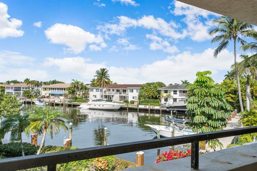 PRICE REDUCTION! BEST RENTAL VALUE BEACHSIDE - DON'T MISS THIS OPPORTUNITY! Experience Oceanside Living in this Waterfront Townhome w/ Deepwater Dockage across the street from the Beach! Bright and Light w/ Private Pool & Patio, this Townhome Features 3 Large Bedrooms, a Downstairs 4th Bedroom/Office/Den and Private Beach Access! Large Primary Suite w/ Waterfront Balcony, Very Generous Closets; Secondary Bedrooms share a balcony and have ample closets! Dockage for your 34' Boat, just Steps from your Patio! Private 2-Car Garage, Impact Windows & Doors!