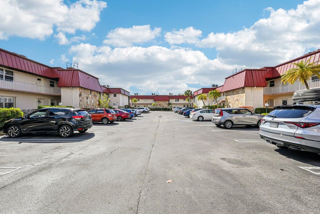 Photo of 12022 W Greenway Drive #103, Royal Palm Beach, FL 33411 (MLS # B26001779)