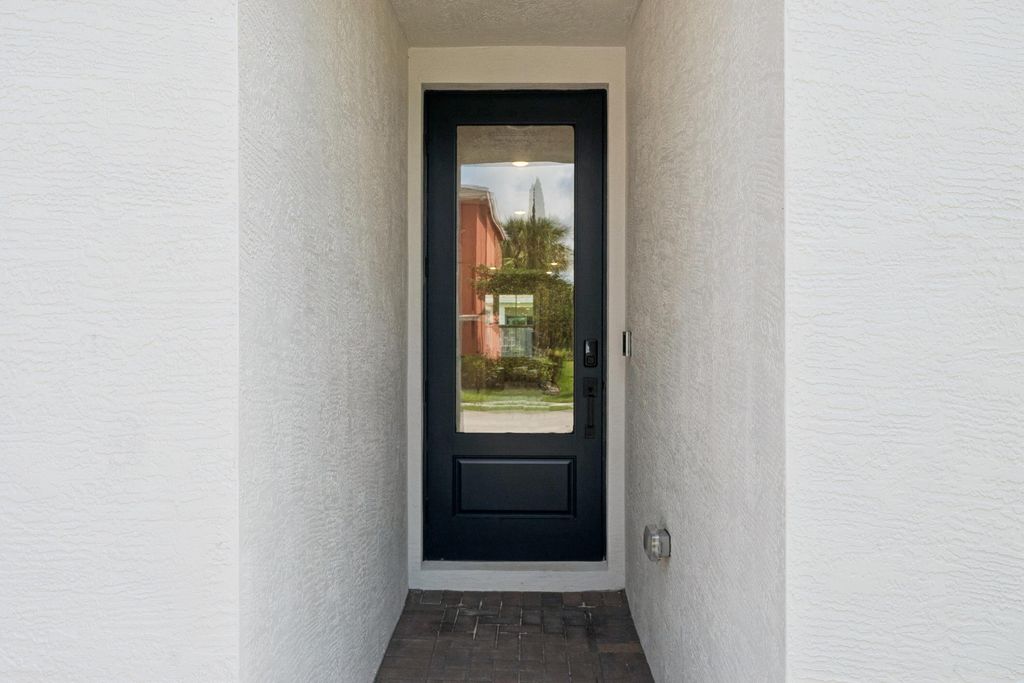 Photo of 9304 Windrift Circle #104, Fort Pierce, FL 34945 (MLS # R11167482)