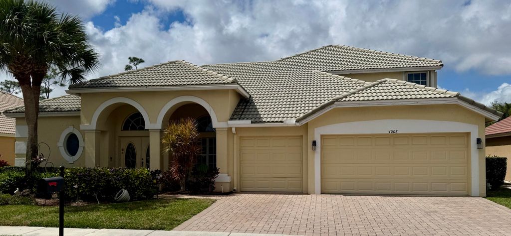 Photo of 4008 W Hamilton Key Ky, West Palm Beach, FL 33411 (MLS # R11169336)