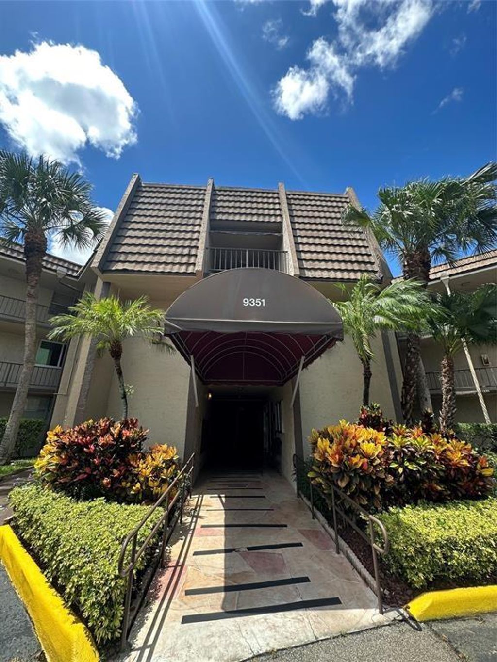 Photo of 9351 Lime Bay Blvd #102, Tamarac, FL 33321 (MLS # F10538232)