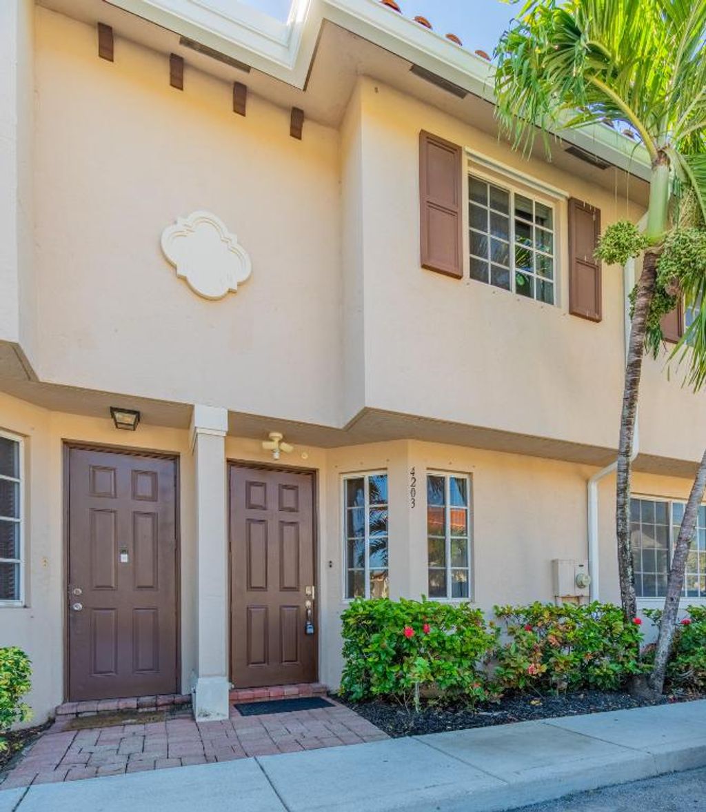 Photo of 4203 Napoli Lake Drive, Riviera Beach, FL 33410 (MLS # R11141862)