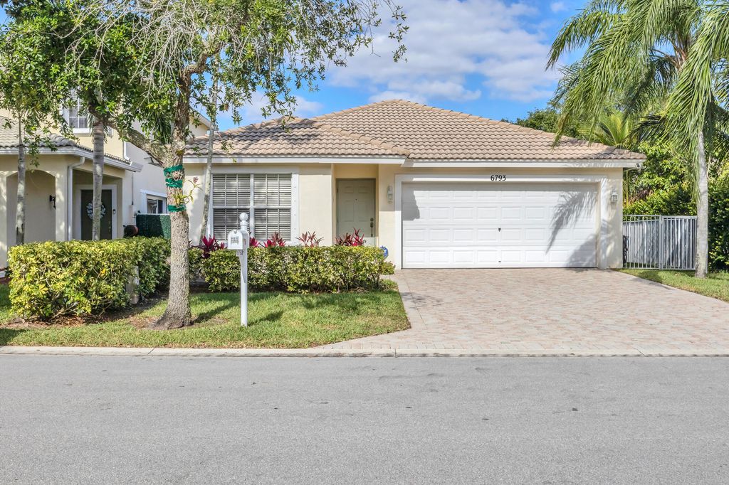 Photo of 6793 E Hendry Drive Dr, Lake Worth Beach, FL 33463 (MLS # R10791922)