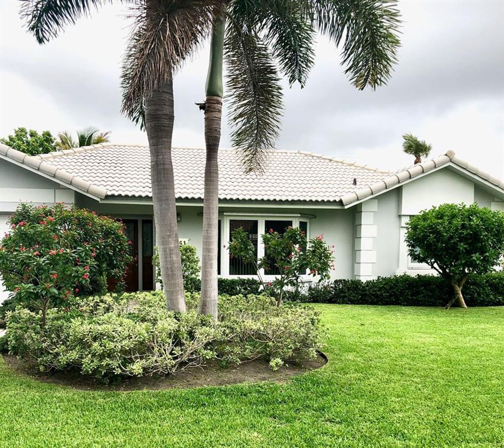 Photo of 1041 NW 4th Street, Boca Raton, FL 33486 (MLS # R10729879)