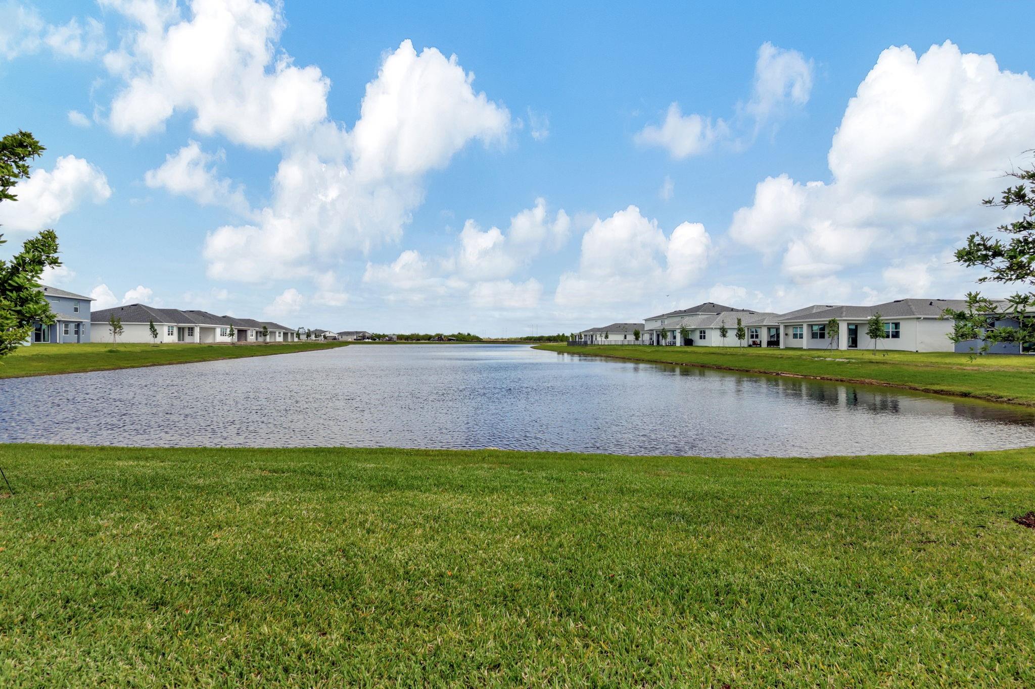 NEVER LIVED IN AND READY TO MOVE IN BRAND NEW GATEWAY MODEL 4 BEDS & 2.5 BATHS. HARD TO FIND OVERSIZED WATERFRONT LOT WITH THE MOST AMAZING LONG LAKEVIEWS AND NORTH EXPOSURE. WALK IN
CLOSETS ON MASTER AND 4TH BEDROOM. PORCELAIN FLOORS THROUGHOUT (NO CARPETS). UPGRADED KITCHEN CABINETS WITH CROWN MOLDING & SOFT CLOSING & SOLID WOOD DRAWERS. WHITE QUARTZ COUNTER TOPS. 10 FT KITCHEN ISLAND & WALK IN PANTRY. BRAND NEW APPLIANCES, WASHER & DRYER. HURRICANE IMPACT DOORS & WINDOWS. BLACKOUT BLINDS INSTALLED ON ALL BEDROOMS. K-8 RENAISSANCE CHARTER SCHOOL & TRADITION PREPARATORY HIGH SCHOOL 1 MILE AWAY. NEW LEGACY HIGH SCHOOL WILL OPEN IN AUGUST 2025 AND IS 500 FEET NORTH OF CADENCE. NEW WESTERN GROVE PARK ONLY 1 MILE AWAY. NEW K-8 SCHOOL PLANNED TO OPEN IN 2026 JUST EAST OF CADENCE.