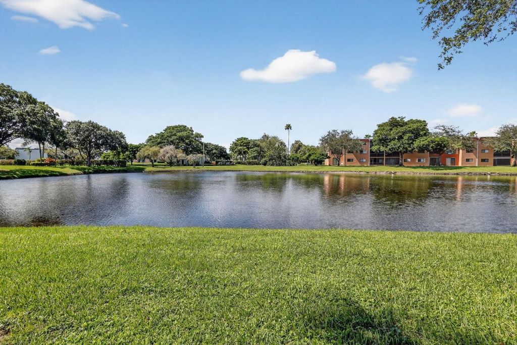 Photo of 5550 Witney Drive #101, Delray Beach, FL 33484 (MLS # R11132277)