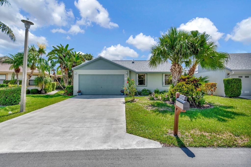 Photo of 1345 NW 25th Lane, Delray Beach, FL 33445 (MLS # R10997038)