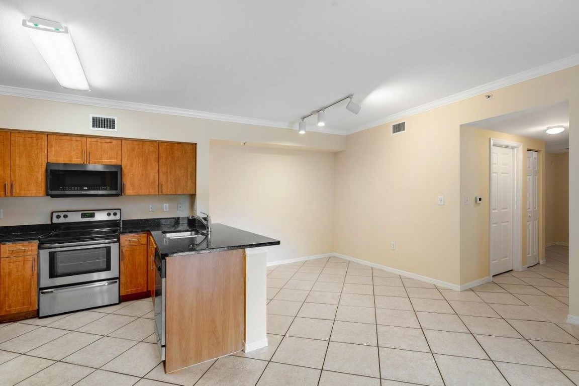 6492 Emerald Dunes Drive 208