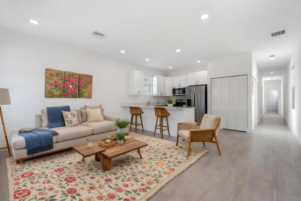 NEW CONSTRUCTION. Excellent SINGLE FAMILY HOME- NO HOA. Great opportunity in the heart of West Palm Beach! Zoned RM and ideally located near major roads, public transportation, downtown, and the airport. North-facing lot on a quiet street with no HOA. Master bedroom has private entrance perfect for primary home or investment opportunity with NO rental restrictions. Airbnb is also available. Some listing photos include virtual staging for illustrative purposes only. Schedule your showing today! Vacant.