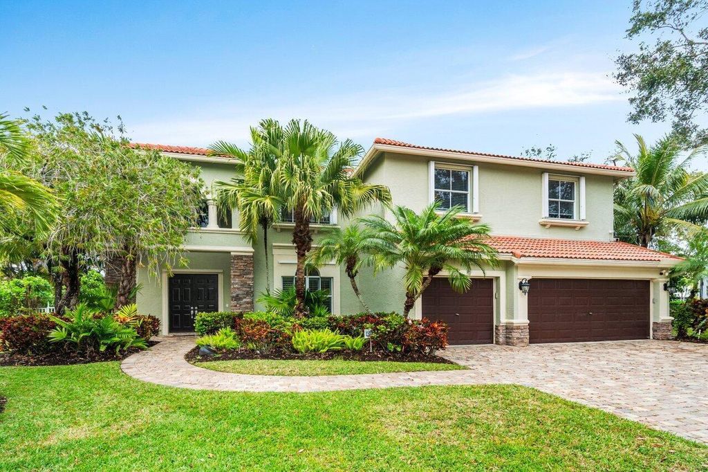 Photo of 257 Spoonbill Lane N, Jupiter, FL 33458 (MLS # B26010644)