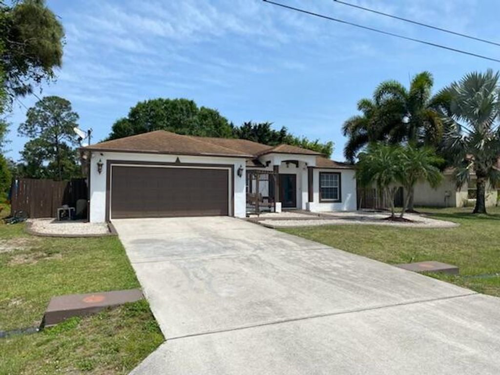 Photo of 4157 SW Endicott Street, Port Saint Lucie, FL 34953 (MLS # R10790964)