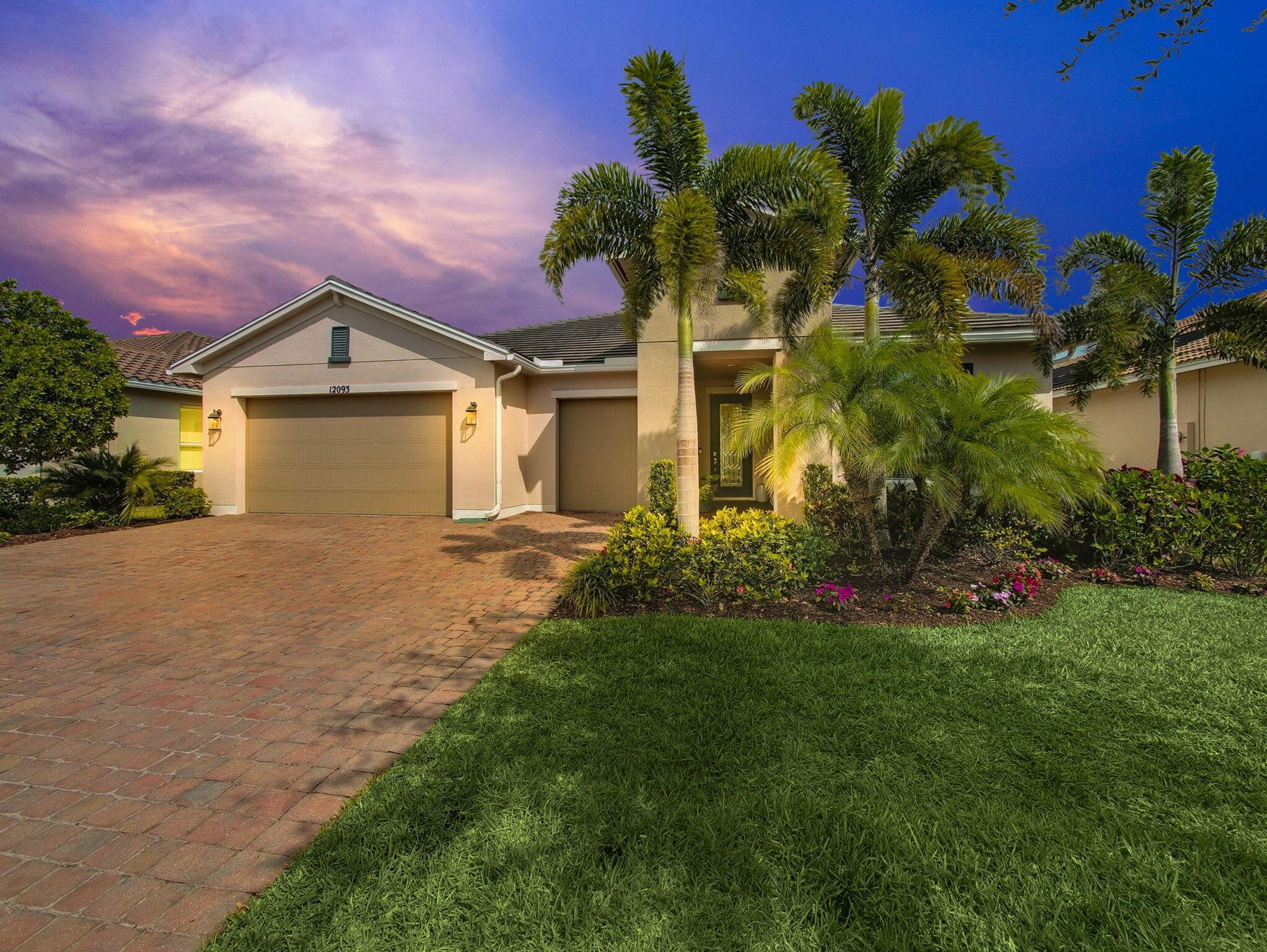 Experience the perfect fusion of luxury, comfort, and vibrant 55+ living in this meticulously maintained Palm Coast model located in the highly desirable Vitalia at Tradition. This spacious home offers 3 bedrooms + a den, 3 full bathrooms, and a 2-car garage plus a dedicated golf cart garage--ideal for those who love to explore and entertain.Designed with seamless indoor-outdoor living in mind, the open-concept layout features a chef-inspired kitchen complete with upgraded stainless steel appliances, double wall ovens, elegant countertops, and custom cabinetry--perfect for both casual meals and hosting guests.