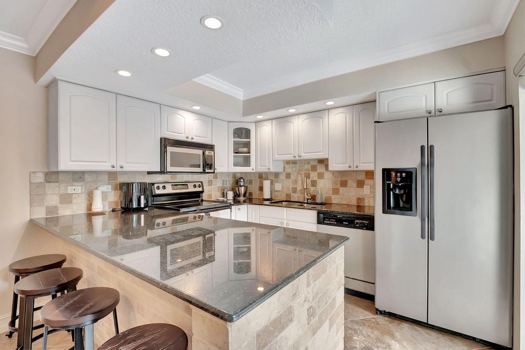 Photo of 1510 Augusta Circle #140, Delray Beach, FL 33445 (MLS # R11129510)