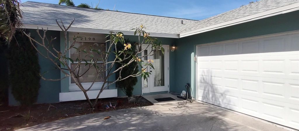 Photo of 2198 SE Dolphin Road, Port Saint Lucie, FL 34952 (MLS # R11080659)
