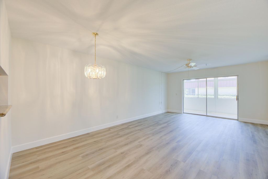 Photo of 12016 S Greenway Cir Circle S #105, Royal Palm Beach, FL 33411 (MLS # B26022117)