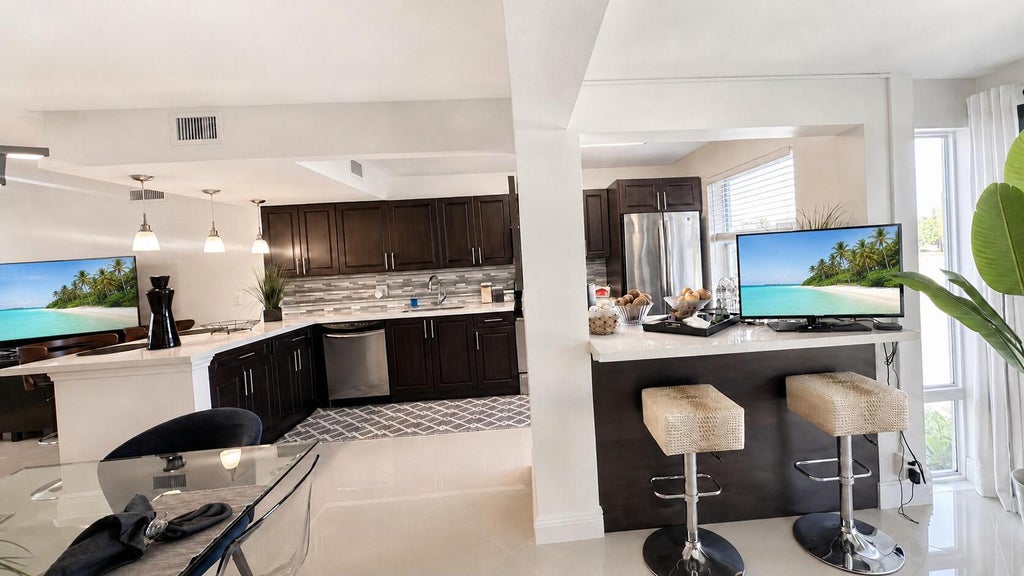 Photo of 34 Colonial Club Drive #202, Boynton Beach, FL 33435 (MLS # B26071117)