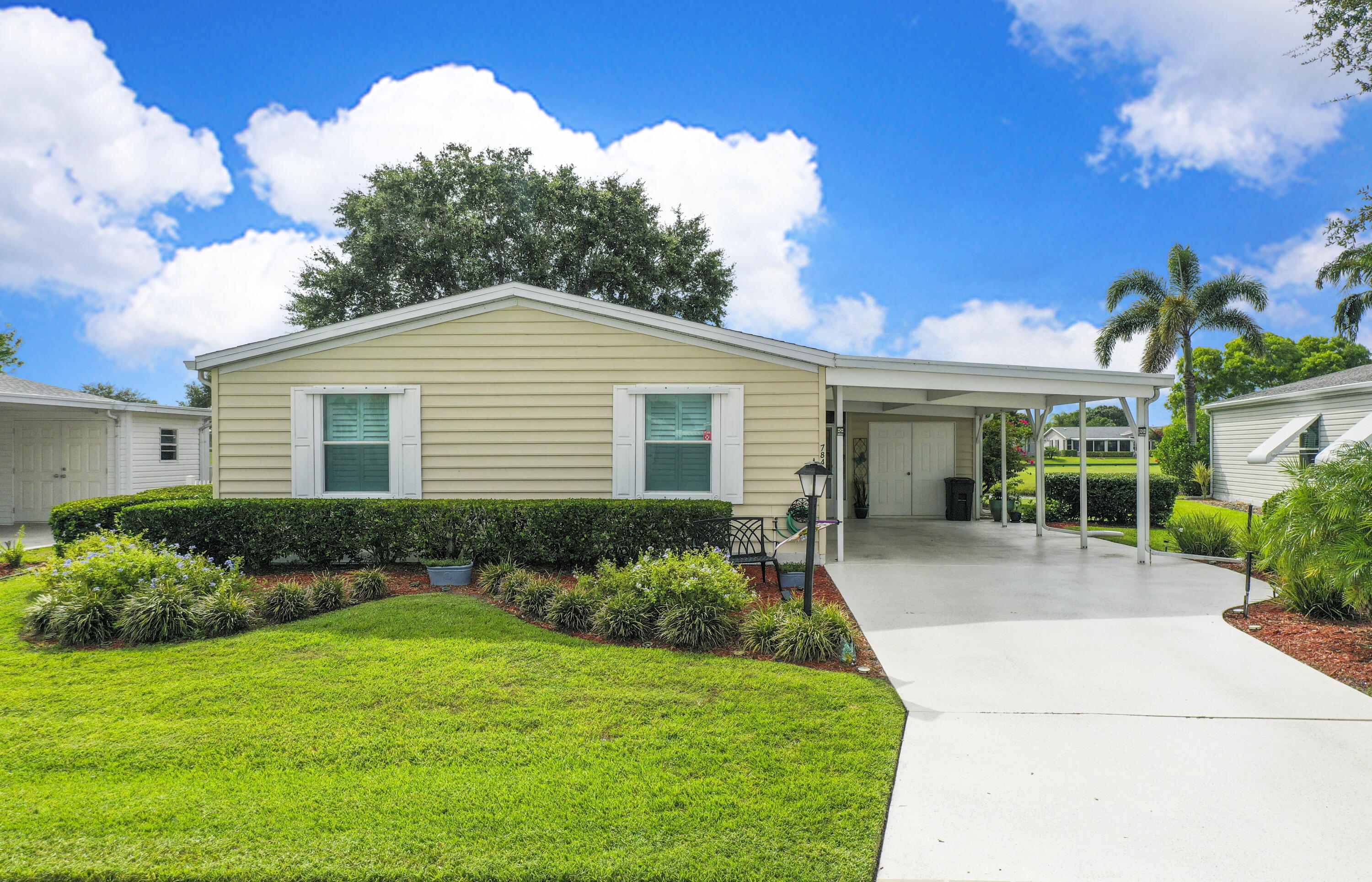 Resort living at its finest. This is an absolutely beautiful 3 bedroom, 2 bath home, move in ready and fully furnished. Split floor plan with extra-large Lania overlooking the lake and golf course. Plantation shutters, all new lighting, new energy saving AC in Lania. New washer and dryer, AC 2018 and roof 2015.