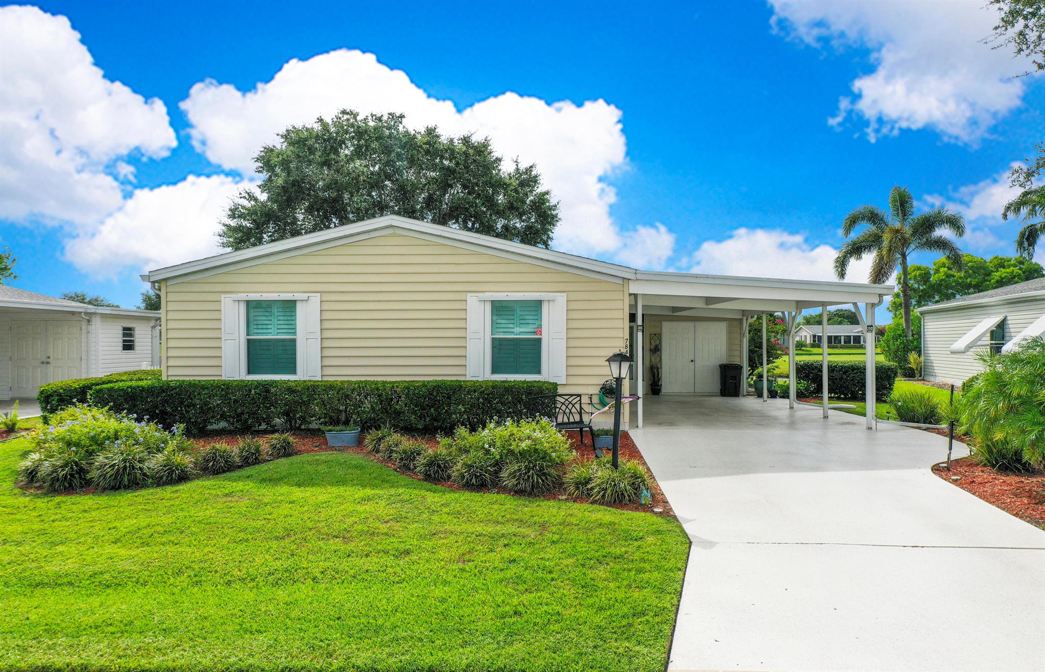 Resort living at its finest. This is an absolutely beautiful 3 bedroom, 2 bath home, move in ready and fully furnished. Split floor plan with extra-large Lania overlooking the lake and golf course. Plantation shutters, all new lighting, new energy saving AC in Lania. New washer and dryer, AC 2018 and roof 2015.