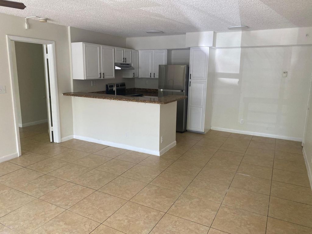 Photo of 601 Lyons Road #7105, Coconut Creek, FL 33063 (MLS # B26027248)