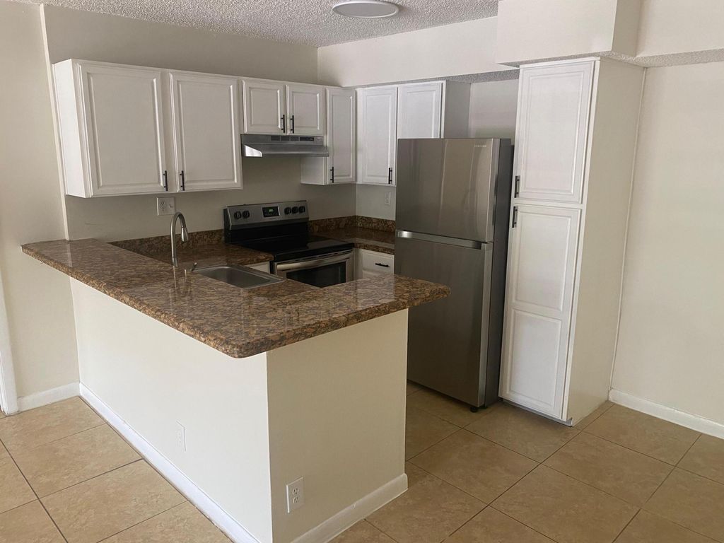 Photo of 601 Lyons Road #7105, Coconut Creek, FL 33063 (MLS # B26027248)