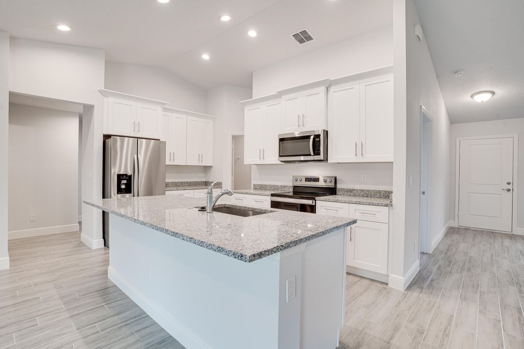 Photo of 2418 SW Lafayette Street, Port St Lucie, FL 34984 (MLS # R10867035)