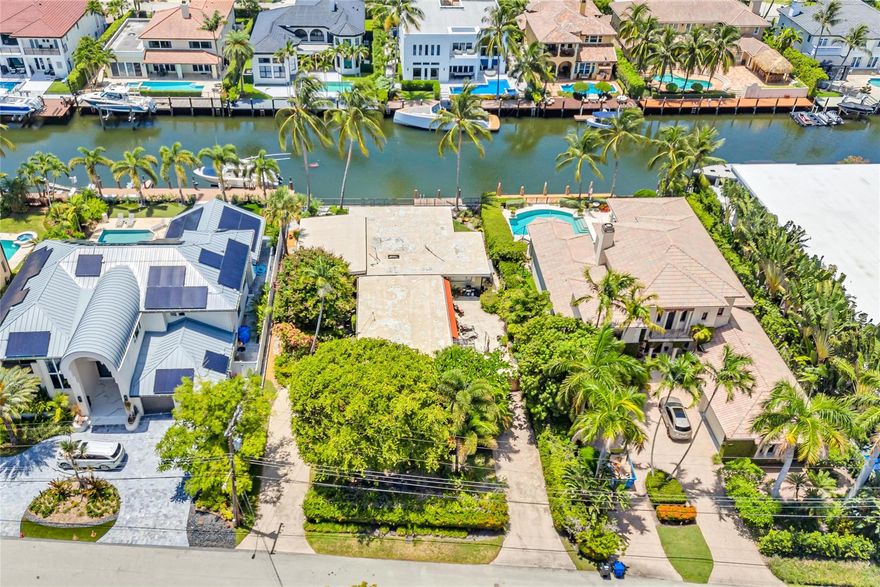 Charming Mid-Century Waterfront Home On EXTRA DEEP LOT in Las Olas’s Exclusive Seven Isles.  First time on the market! Situated on an oversized 12,450 SF lot with 80 feet of prime water frontage, likely a tear down, this classic one-story Mid-Century home offers potential in one of Fort Lauderdale’s most prestigious neighborhood. OVERSIZED LOT SIZE - 80" water x 160' X 151". Designed and built for the original owners, the property is a rare opportunity—perfect for redevelopment or a thoughtful renovation. Deep water dockage can accommodate a 65’ yacht, ideal for boating enthusiasts. Whether you’re looking to build a new luxury estate or restore this architectural gem, the property is being offered at land value, making it a compelling investment in a sought-after waterfront location.