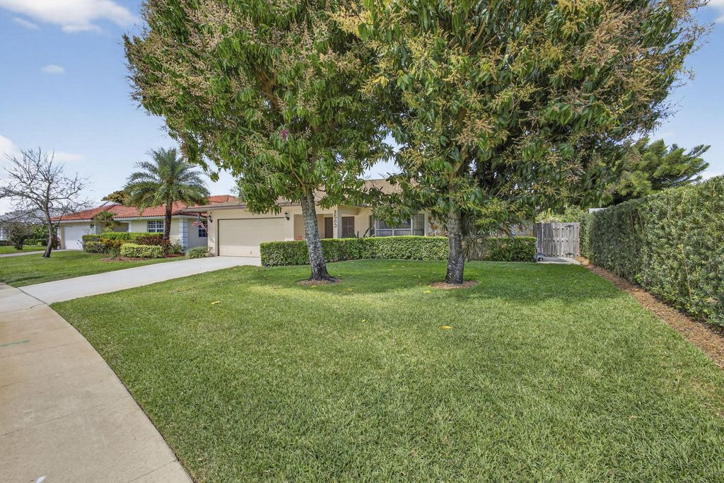 Photo of 2583 W Carandis Road, West Palm Beach, FL 33406 (MLS # B26000792)