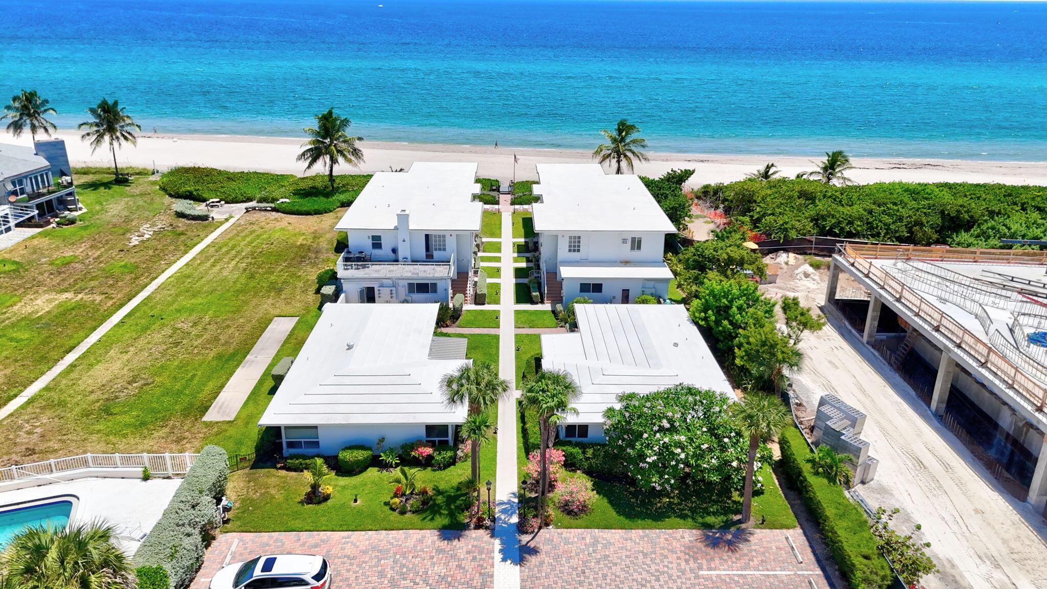 This is your Ultimate Beach Retreat with a slice of Old Florida Charm-This adorable 1 bedroom ''pied-a-terre'' has great ocean views and features a beautifully renovated kitchen with stainless appliances and granite, ''wood'' vinyl floors, bar with beverage cooler, renovated bath and master bedroom. All Impact doors and windows, newer split a/c units, and a washer and dryer in unit. Direct ocean access only steps from your unit and the heated community pool is on the intracoastal side of the complex. This is an opportunity to own a true beachfront retreat with timeless character and modern upgrades. Ideal for those seeking tranquility, exclusivity, and direct access to Florida's coastal beauty.