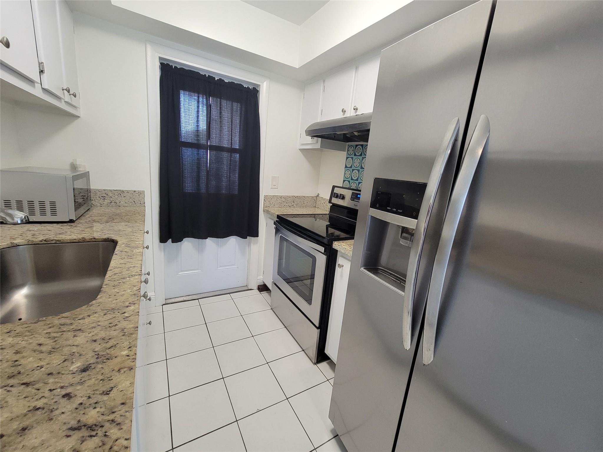 1050 E Sample Road 203