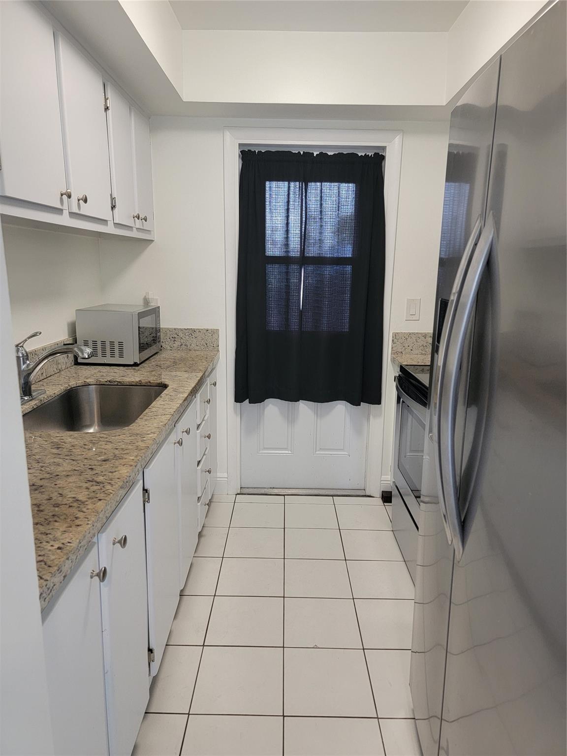 1050 E Sample Road 203