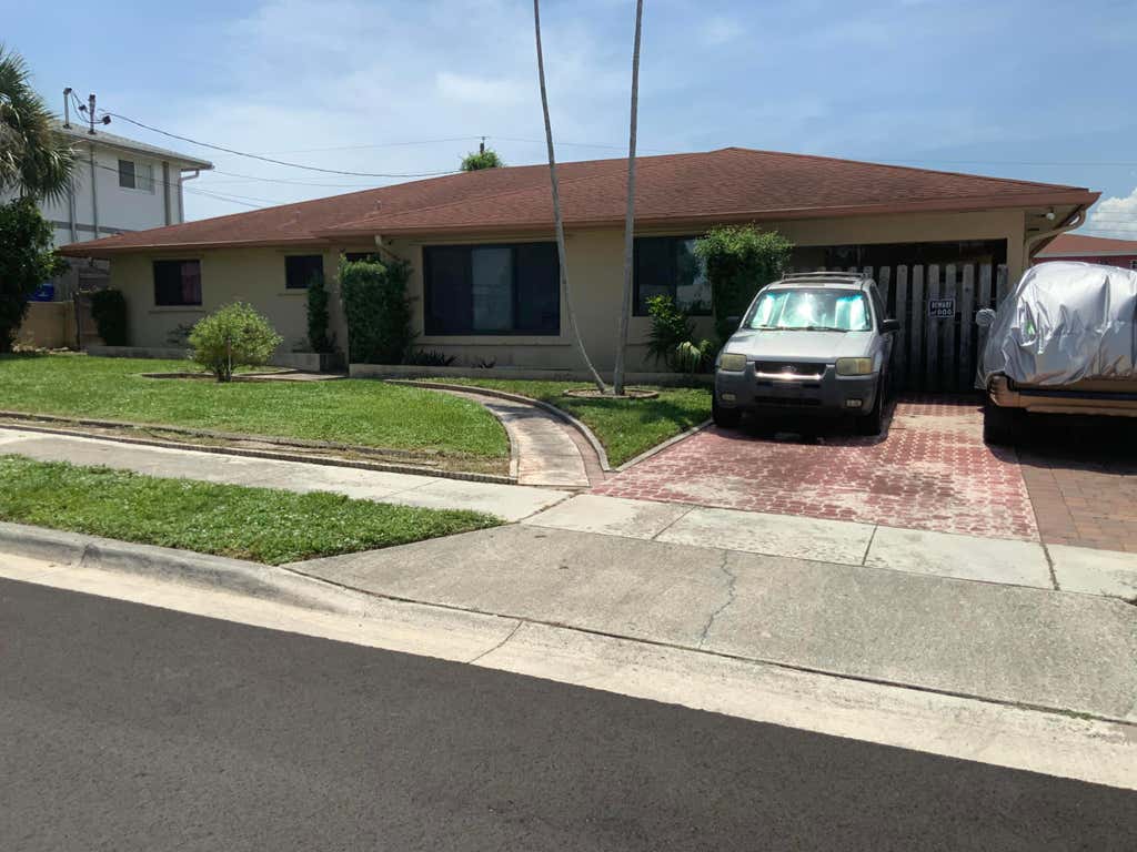 Photo of 941 W 7th Street, Riviera Beach, FL 33404 (MLS # B26064855)
