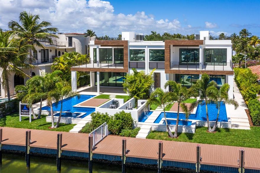 ONLY ONE LEFT!
Brand-New Coastal Contemporary Homes by Ellemar Luxury Construction sited minutes to the Hillsboro Inlet.

This rare waterfront home includes luxe amenities such as a two-bay garage and large open great room plan. Light filled interiors compliment the open gourmet chef's kitchen with top of the line appliances.

Luxurious second level master suite with large private balcony and an expansive third level sky deck. Outdoor entertaining is enjoyed at the resort style pool with spill-over spa and outdoor summer kitchen.

Full service yacht dock for the avid boater. Five(5) additional parking spaces deeded across the street for plenty of guest parking!