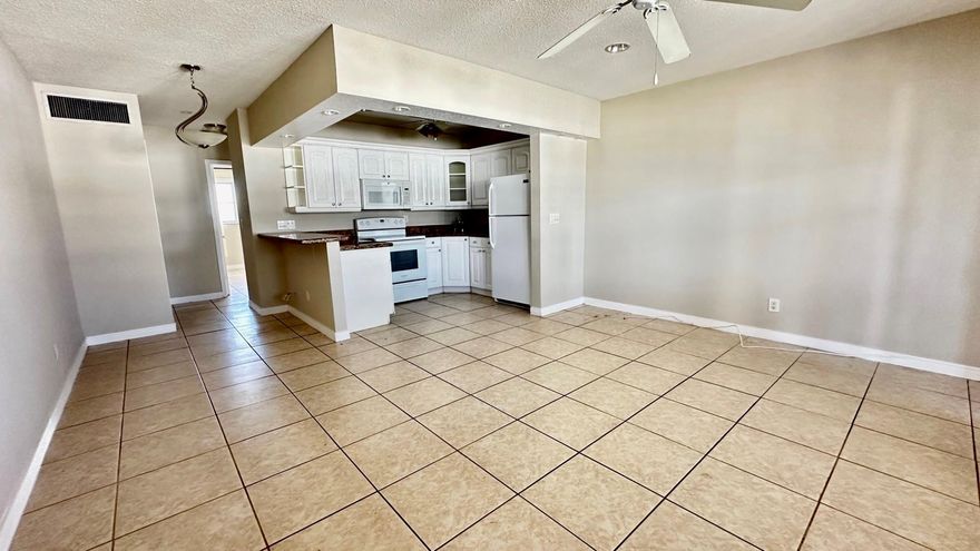 Spacious one-bedroom, one-bath apartment located on the top floor of a three-story building with an elevator. Nice kitchen featuring a granite kitchen counter and wood cabinets. There is plenty of closet space available, and laundry facilities are on-site. Enjoy great amenities, including a pool, jacuzzi, and shuffleboard. Water and basic cable are included in the rent. A credit score of 650 is required for at least one tenant. We are only asking for the first month's rent and a security deposit to move in. Please note that no pets are allowed per HOA regulations; emotional support animals are considered on a case-by-case basis.