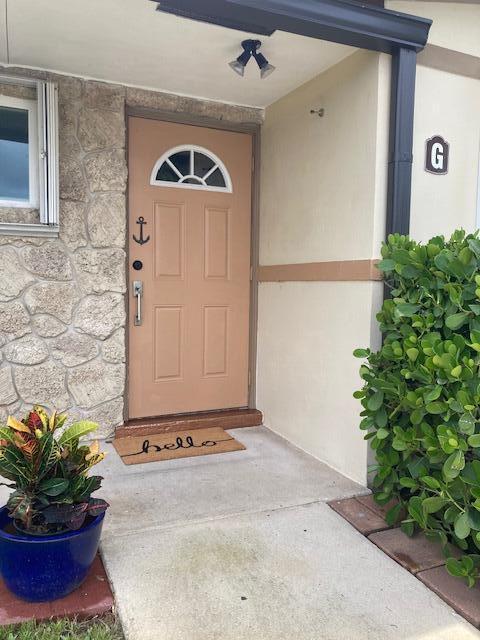 Welcome to this beautifully maintained 2-bedroom, 2-bath residence in a sought-after 55+ community. Recently upgraded with a brand-new central A/C system, new roof, and bronze gutters, this home is truly move-in ready. Step inside to find designer artwork, custom furnishings, and three Samsung wall-mounted smart TVsa"all included. The open-concept kitchen is a chef's dream, featuring granite countertops, soft-close cabinets, pot filler, stainless steel refrigerator, wine fridge, center island with built-in wine cooler, custom molding, and LED lighting. Throughout the home, enjoy porcelain tile flooring, glass white tile flooring in the closets, crown and base molding, and privacy shades in the bedrooms. Relax on your private lanai lined with Foxtail palm trees, See it today!!