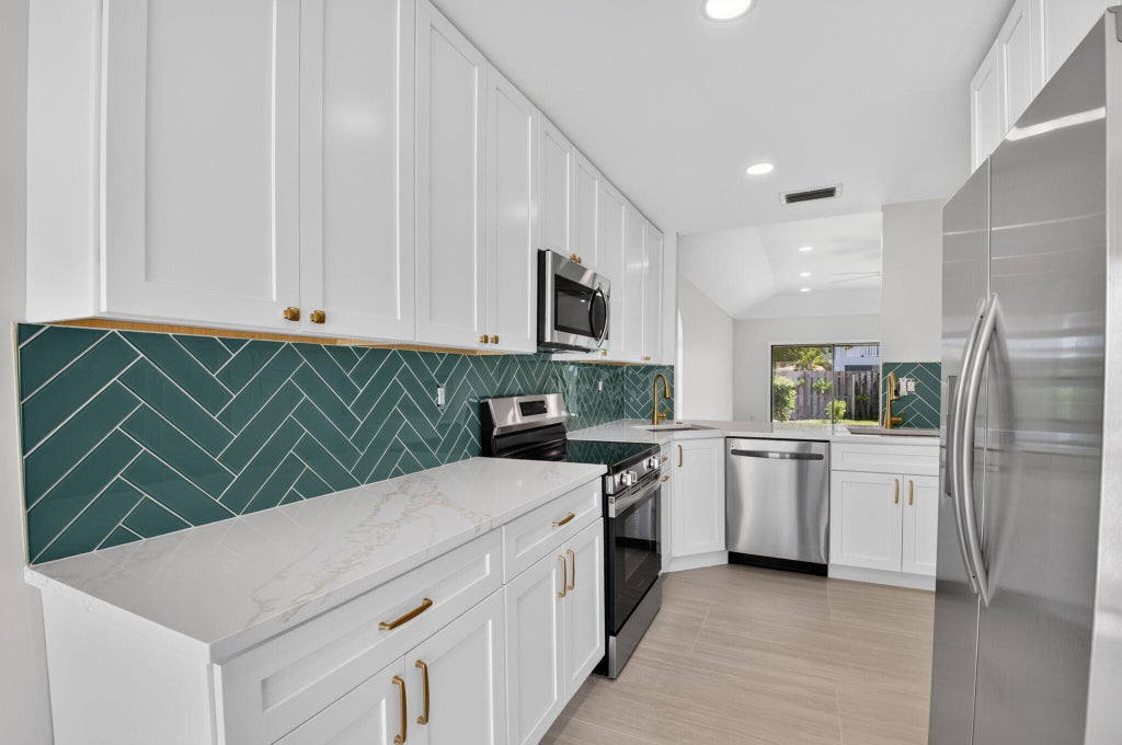 Photo of 4398 NE 5th Avenue, Boca Raton, FL 33431 (MLS # B26076963)