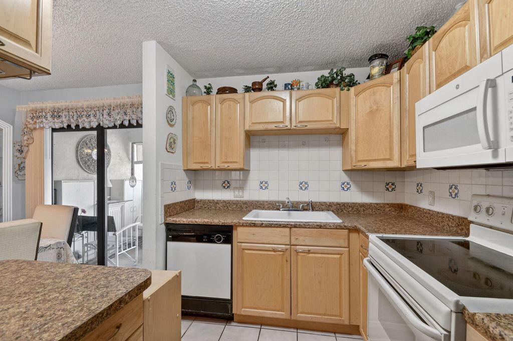 Photo of 2730 Ida Way #16a, West Palm Beach, FL 33415 (MLS # B26018711)