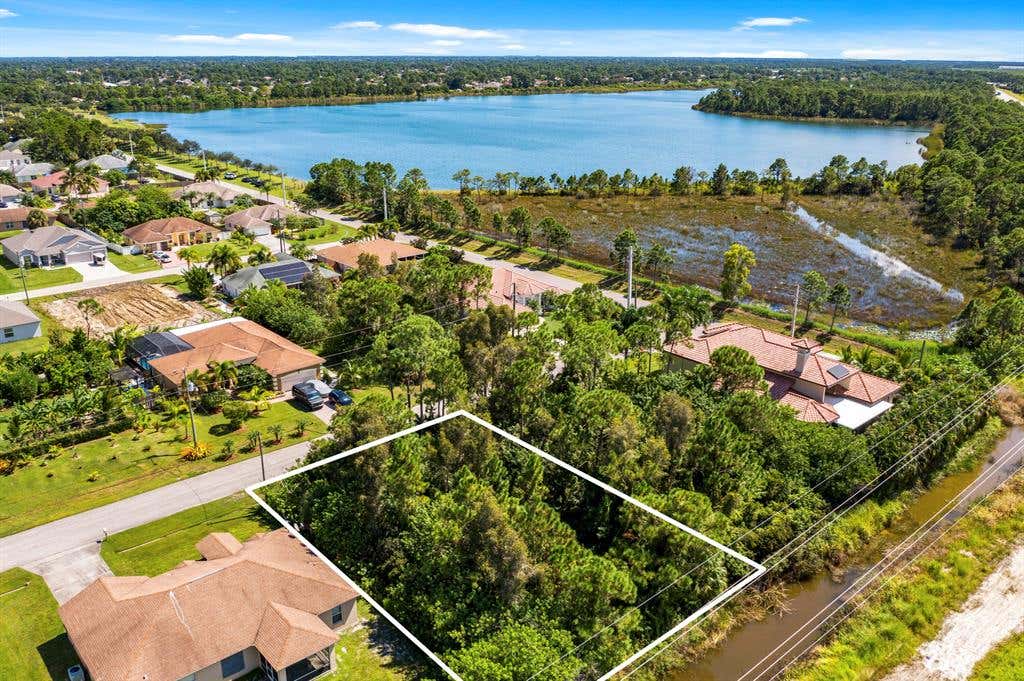 Photo of 3174 SW Letchworth Street, Port Saint Lucie, FL 34953 (MLS # R10750138)